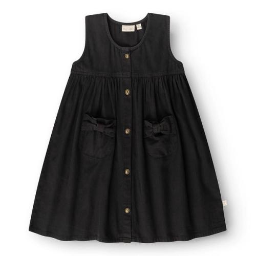 Kids denim dress packshot on white background — childrenswear ecommerce GoPackshot