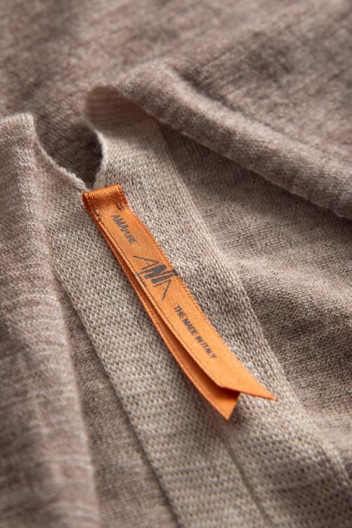 Poncho label macro detail photography for accessories ecommerce