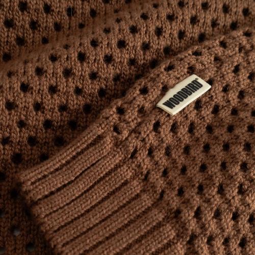Sweater open knit cuff label detail — menswear photography GoPackshot
