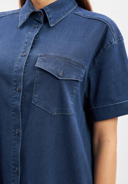 Denim shirt pocket detail photography — studio macro GoPackshot