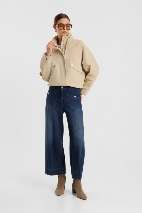 Wide-leg jeans on-model photography with button detail — denim ecommerce GoPackshot