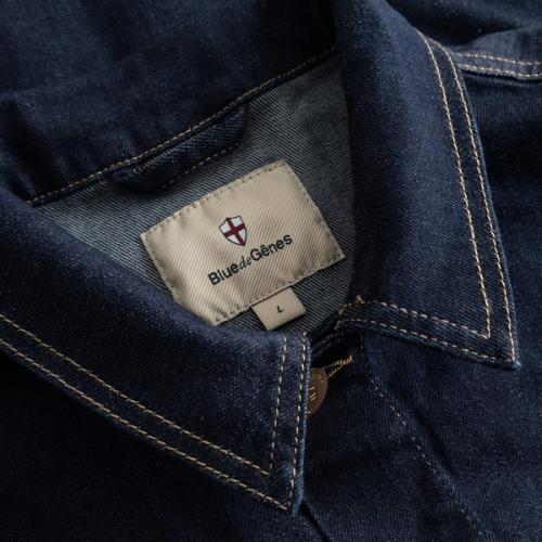 Denim jacket label detail photography — studio close-up GoPackshot