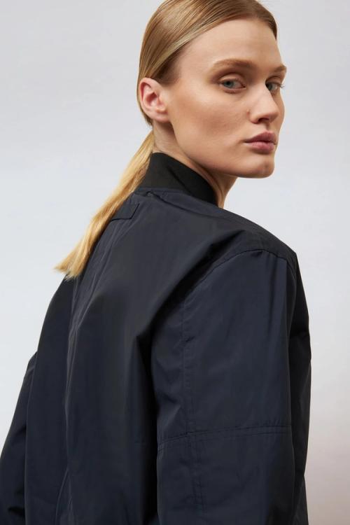 Jacket on-model back view photography — womenswear ecommerce studio GoPackshot