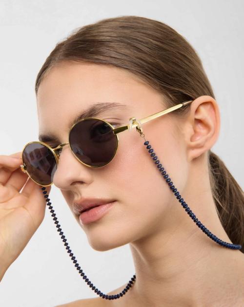 Sunglasses with bead chain on-model — lifestyle eyewear photography GoPackshot
