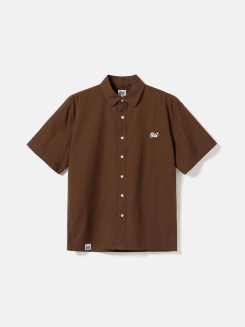 Denim shirt flat-lay on light background — packshot GoPackshot