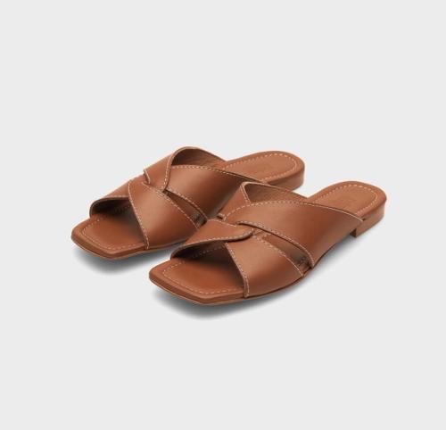 Slide sandal packshot on neutral grey background — ecommerce photography GoPackshot