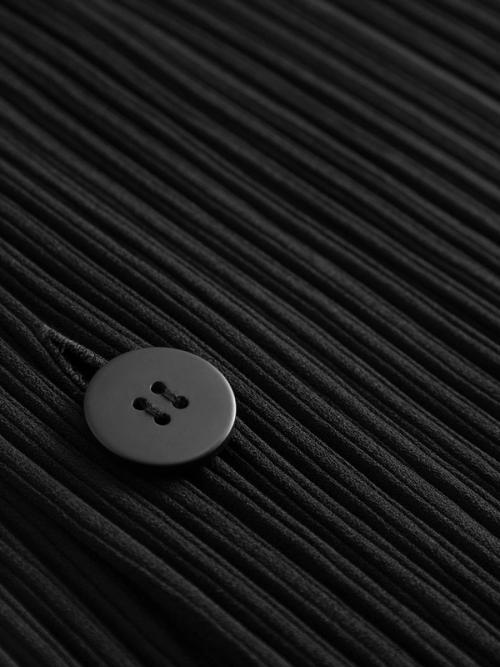 Blouse button detail close-up photography — womenswear ecommerce studio GoPackshot