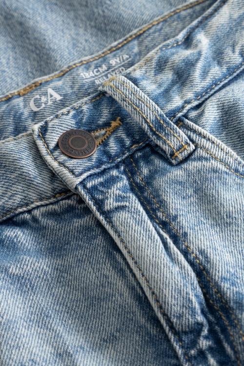 Kids jeans button detail close-up photography — childrenswear studio GoPackshot