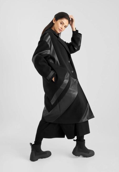 Jacket packshot in controlled studio for consistency — womenswear ecommerce GoPackshot