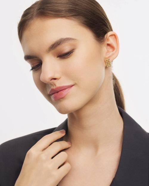 Earring on-model showing hoop fit on ear — jewellery photography GoPackshot