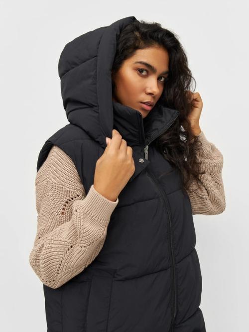 Jacket on-model photography with layered styling — womenswear ecommerce GoPackshot