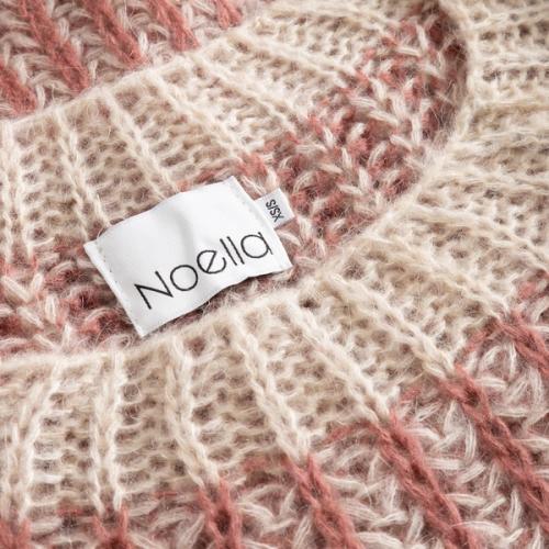 Sweater knit fabric label detail photography — womenswear ecommerce studio GoPackshot