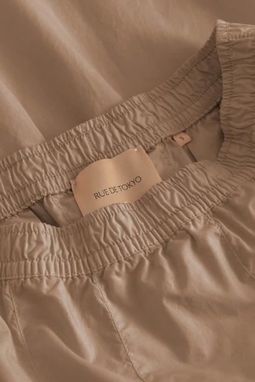 Pants waistband label detail close-up photography — womenswear ecommerce GoPackshot