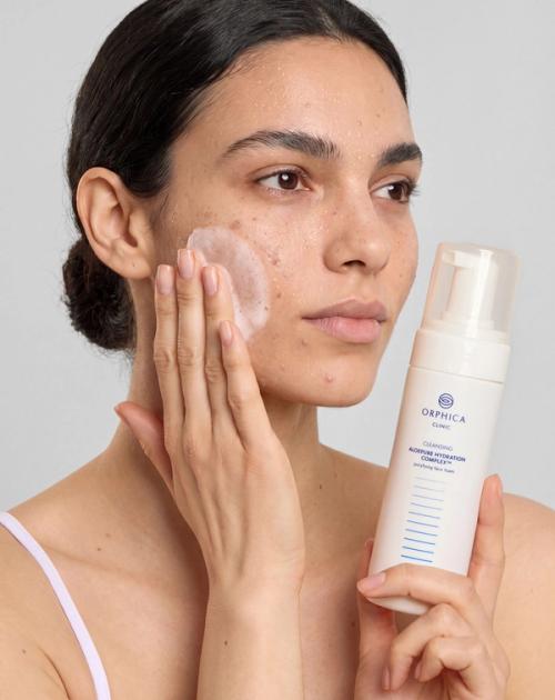 Cleansing foam on-model application photography with lather detail — GoPackshot