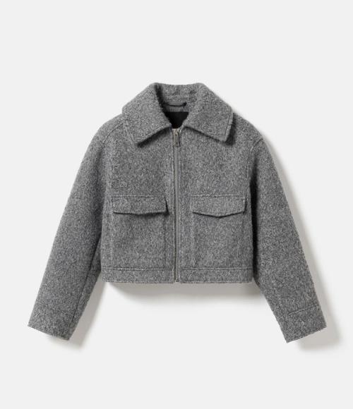 Jacket flat-lay packshot on white background — womenswear ecommerce GoPackshot