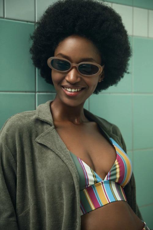 Bikini on-model photography in studio — swimwear ecommerce GoPackshot