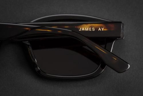 Sunglasses on dark background with brand detail — editorial eyewear photography GoPackshot