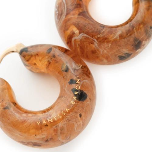 Earrings packshot on white background — chunky hoop jewellery photography GoPackshot