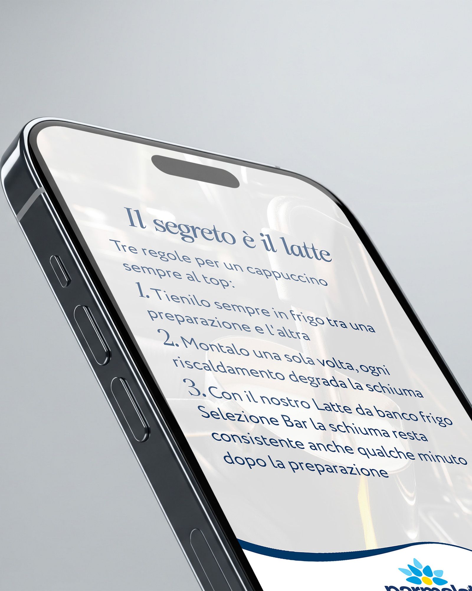 Smartphone in close-up showing 'three rules for the perfect cappuccino' and the Parmalat Professional logo on a grey background
