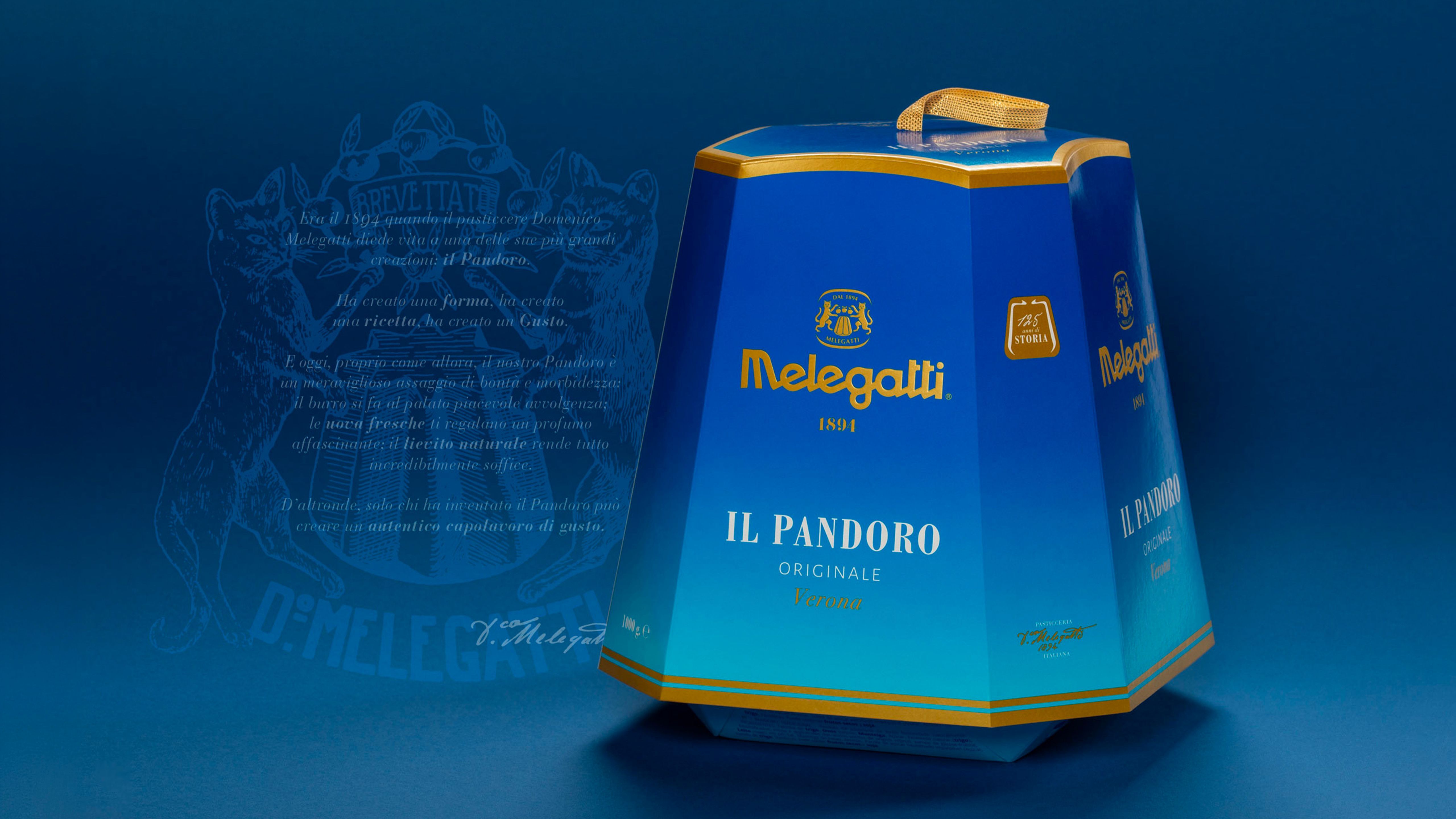 Blue and gold Melegatti Pandoro Originale pack on a blue background with crest and decorative text.