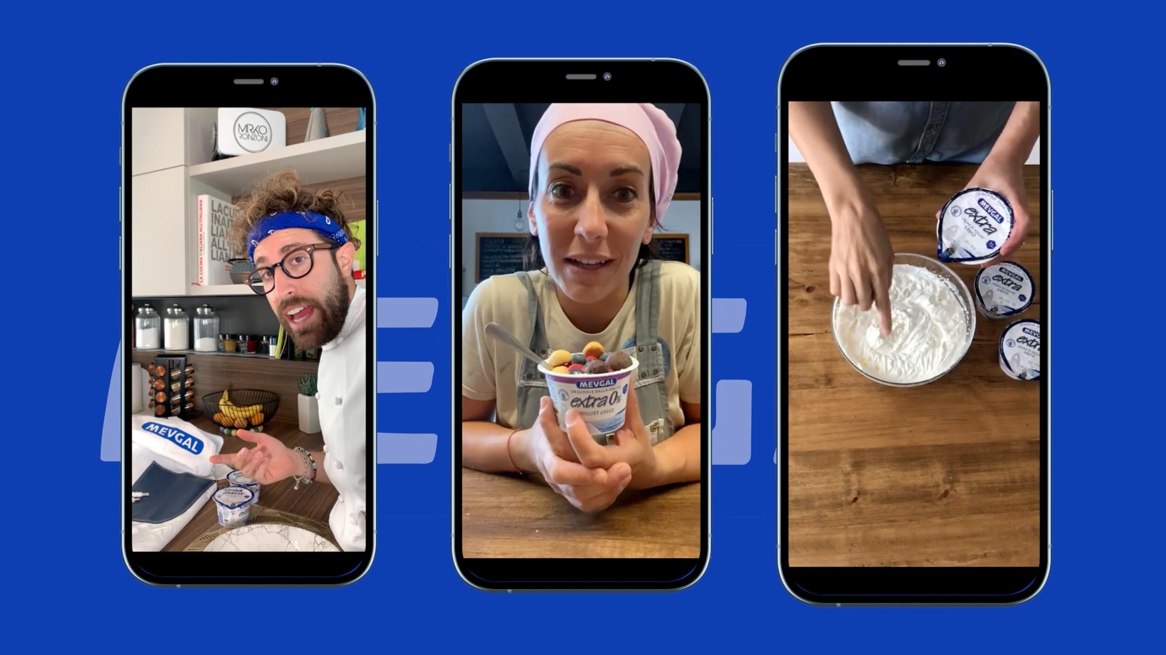 tre-smartphone-affiancati-mostrano-video-verticali-di-influencer-che-promuovono-lo-yogurt-mevgal-extra-zero-per-cento-a-sinistra-un-uomo-in-cucina-al-centro-una-donna-con-lo-yogurt-alla-frutta-a-destra-mani-che-intingono-un-dito-in-una-ciotola-di-yogurt