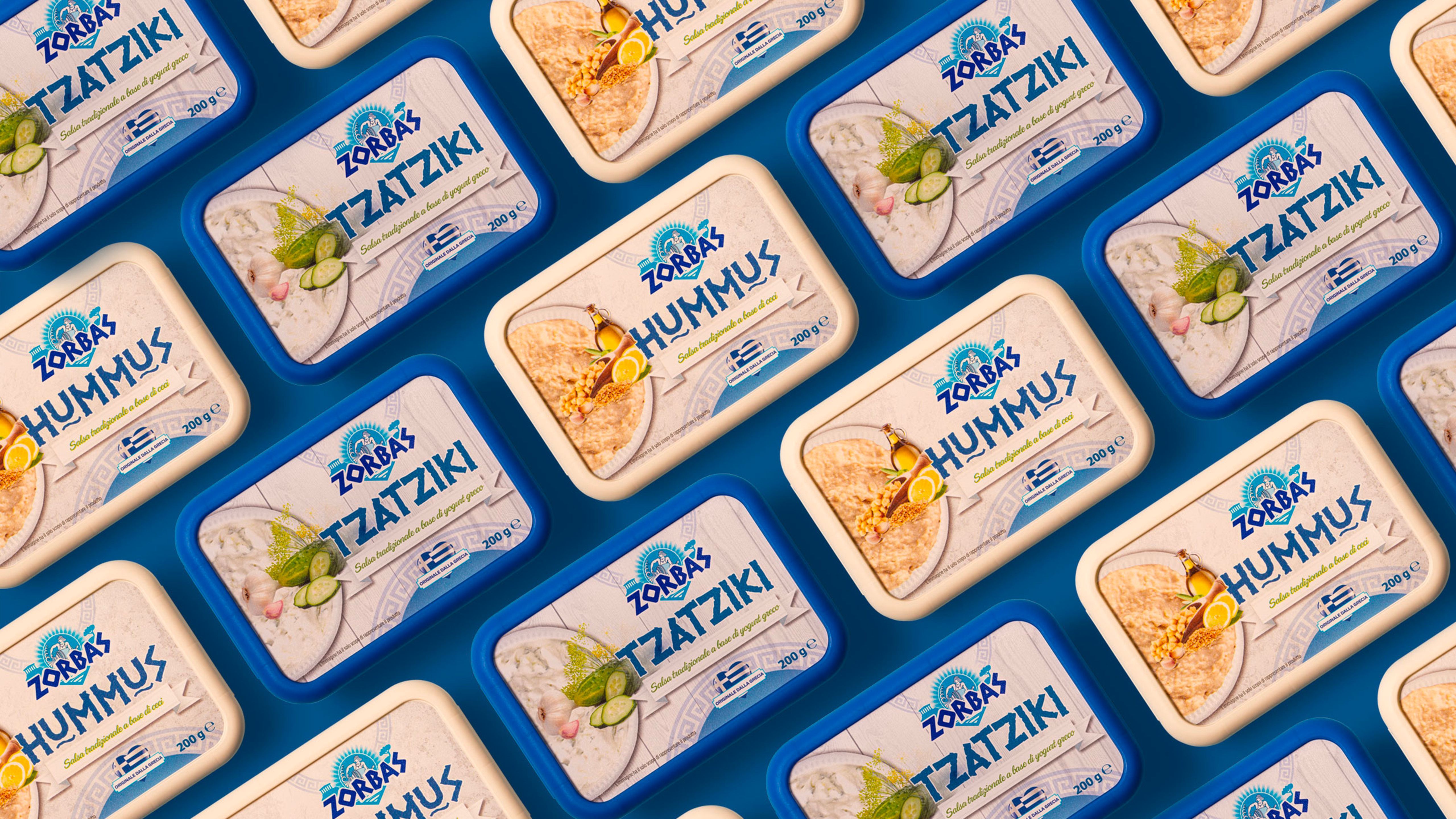 A composition of Zorbas tzatziki and hummus packs arranged diagonally on a blue background.