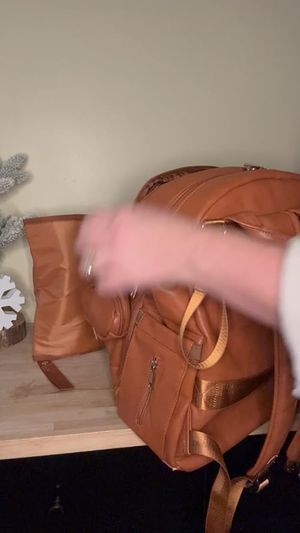 SO.MUCH.STORAGE! The cutest backpack for all things baby