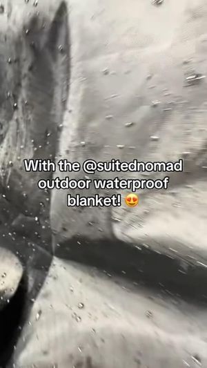 The only way to enjoy a rainy game!