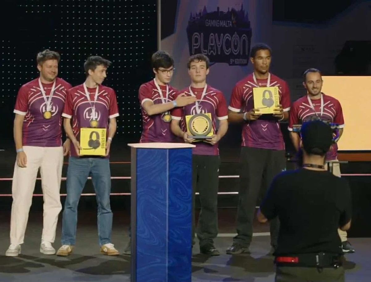 The Lycée team on stage at PlayCon receiving the Rocket League world title
