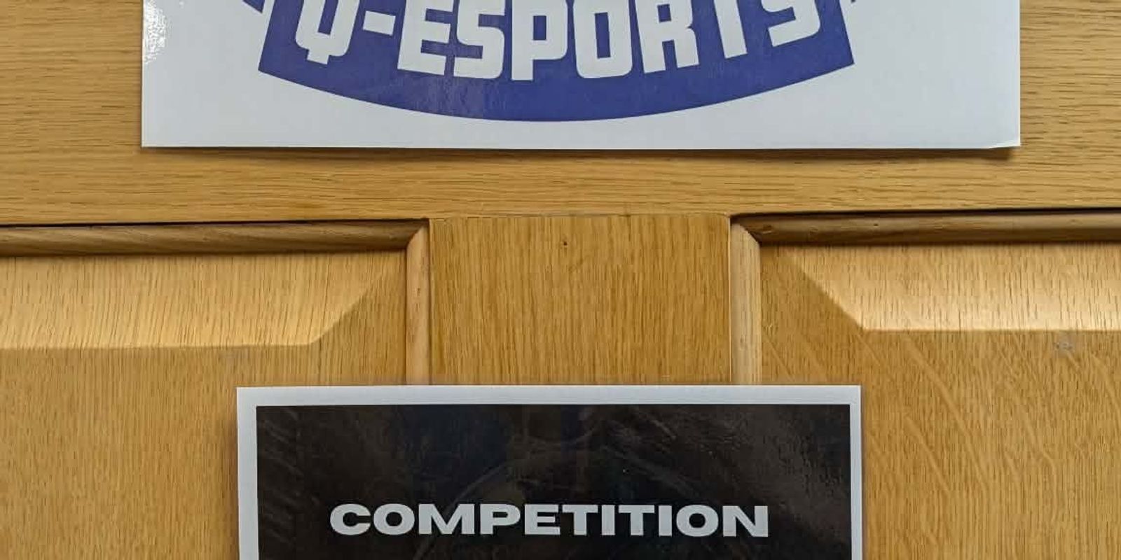 The Q-Esports competition room sign at Queen Ethelburga's Collegiate