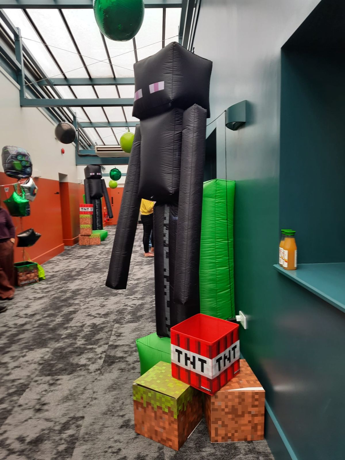 Minecraft decorations in the esports room, with an Enderman and blocks