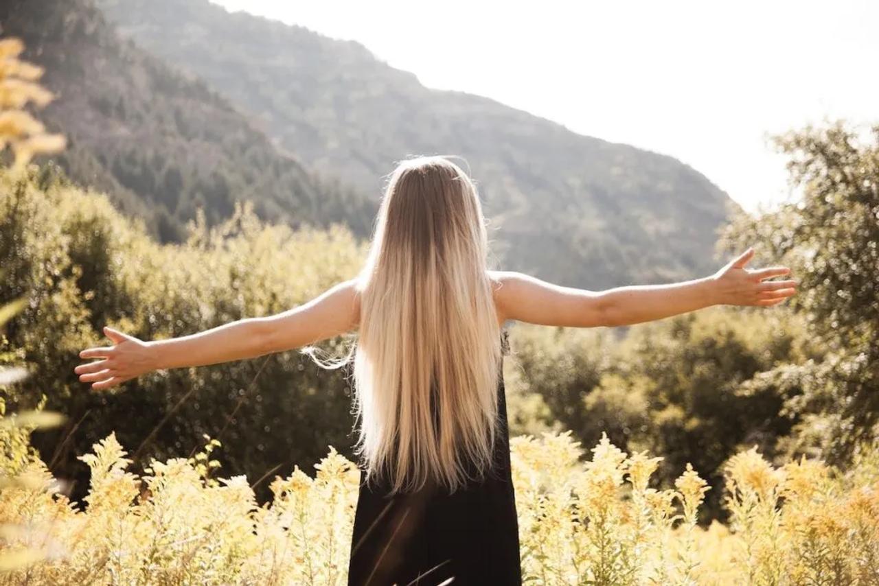 Picture of woman happy investing in therapy cost