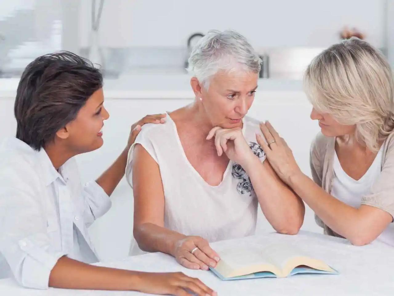 Family comforting anxious person