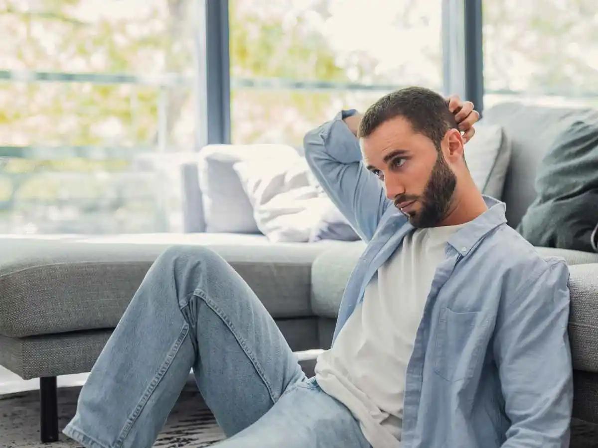 Person experiencing OCD anxiety at home