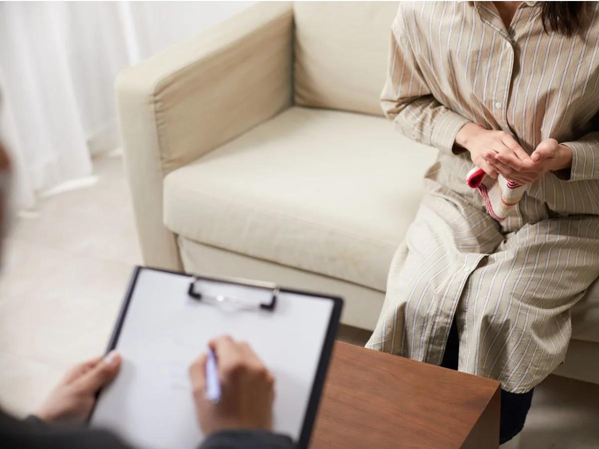 Psychologist counselling patient