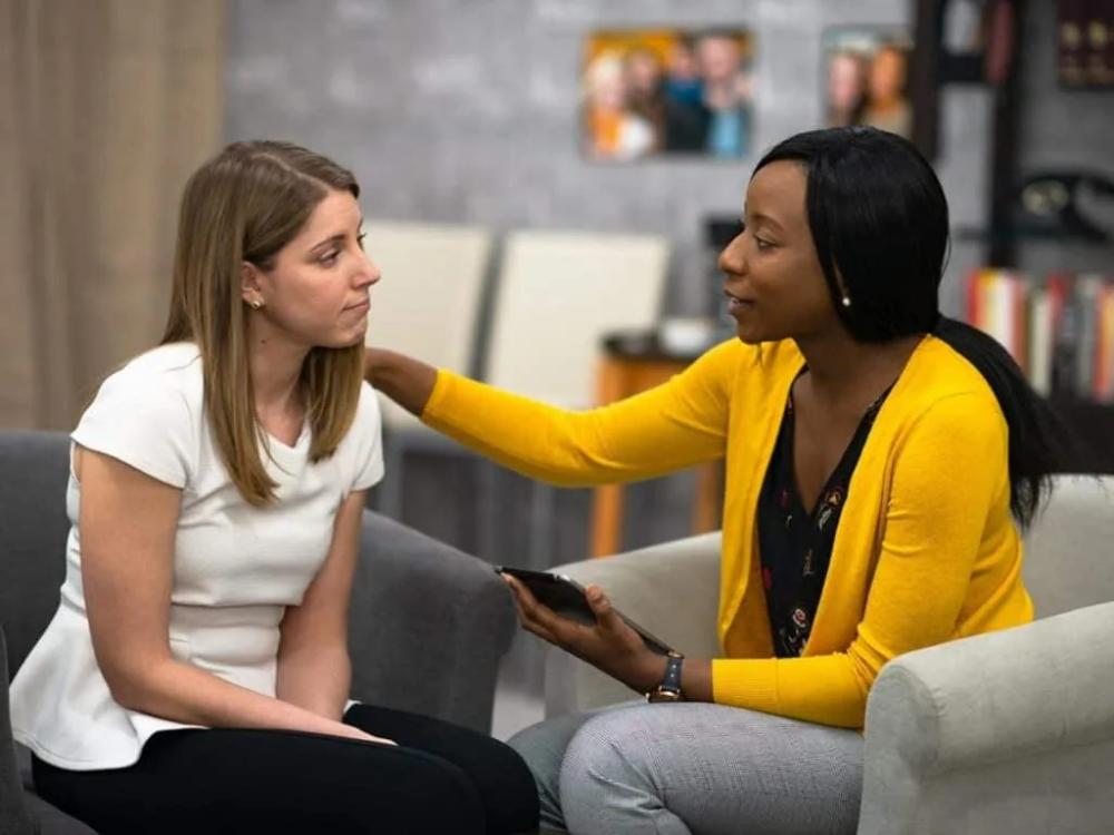 Supportive therapy session illustrating mindfulness-based work at Select Psychology