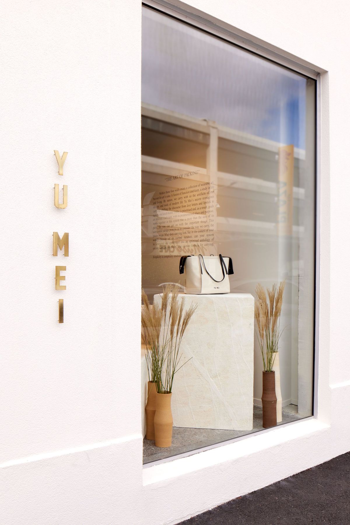 Shop front display for high end luxury leather made goods by New Zealand brand Yu Mei