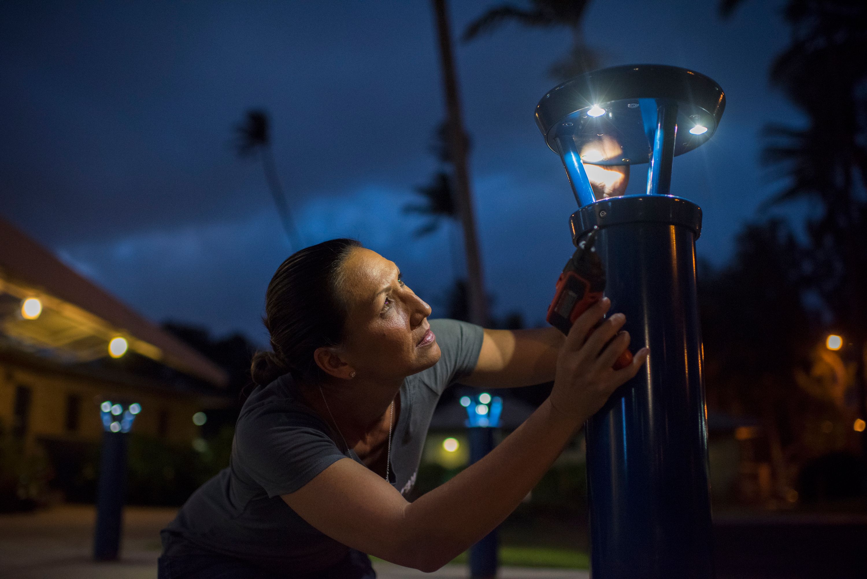 Video cover image shows entrepreneur Lia Young Hunt installing a light