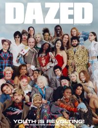 A diverse group of adults wearing colorful and eclectic clothing pose closely together in front of a cloudy sky background with the bold text "DAZED" and the phrase "YOUTH IS REVOLTING! THE CHARACTERS MAKING A STATEMENT" displayed prominently.