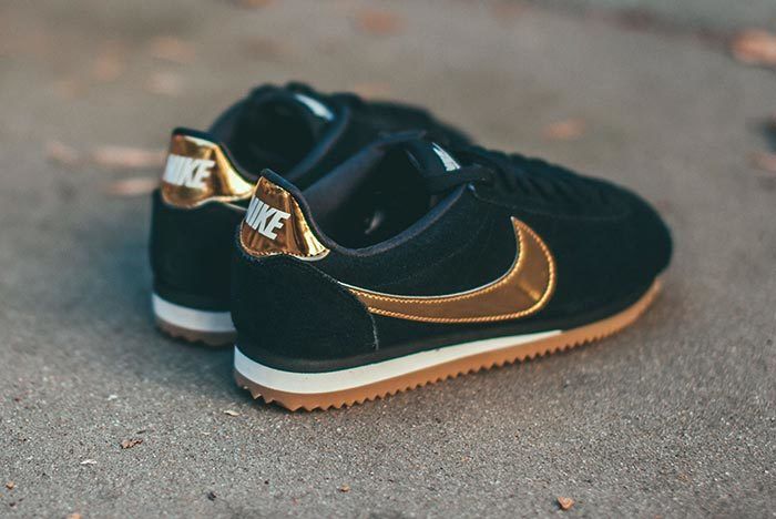 nike cortez black and gold