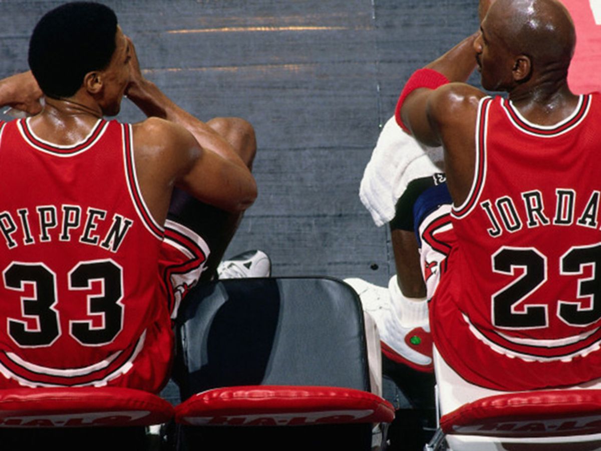 What jersey number did Michael Jordan wear during his playing days?