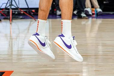 Devin Booker Shows Off 'Phoenix Suns' Nike Book 1 On Court