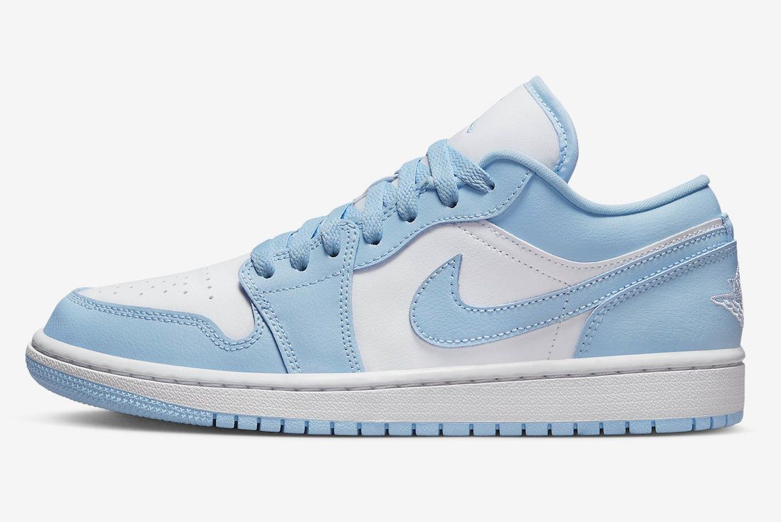 light blue and white low top jordans