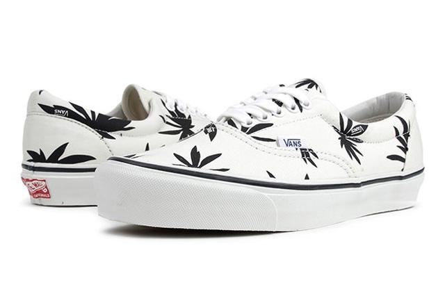 White Vans sneakers weed shoes on white surface