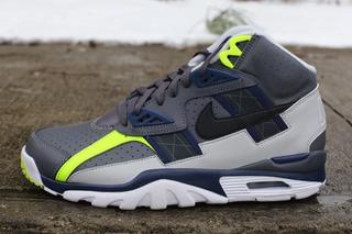 grey and neon nike shoes