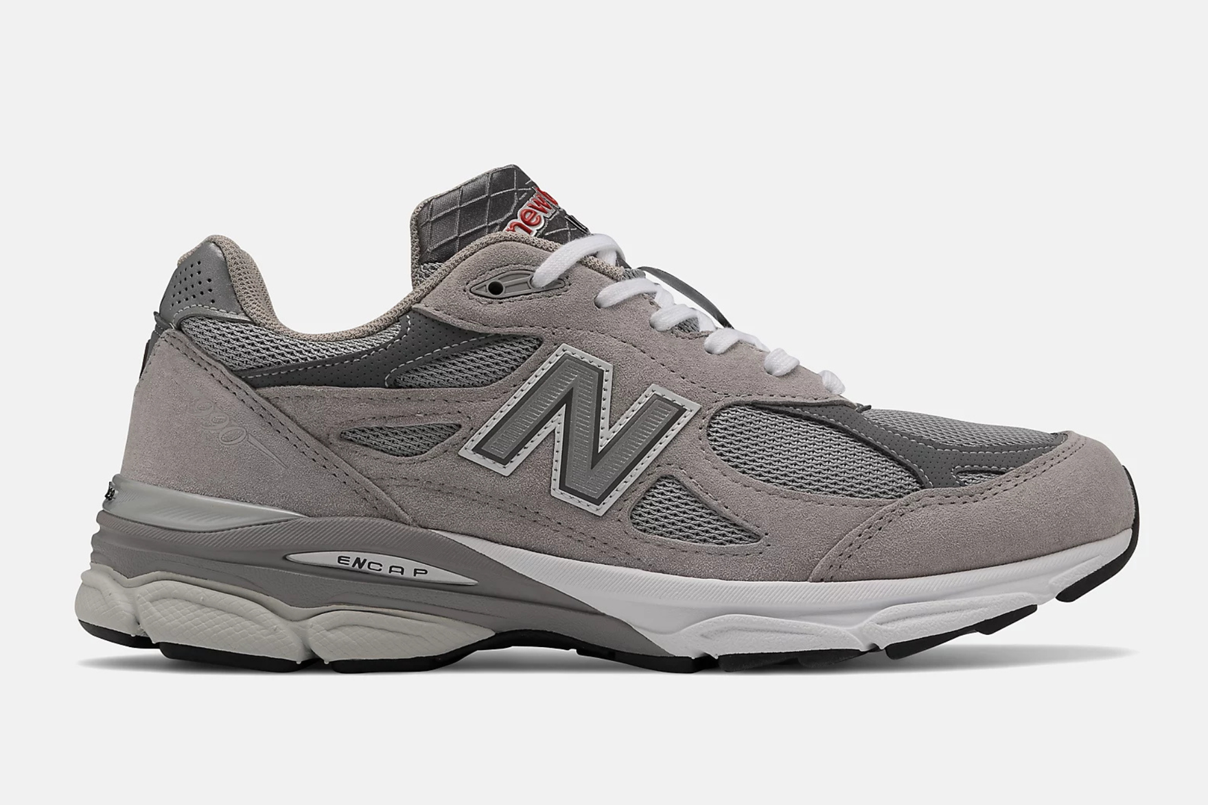 new balance 990v3 grey sneaker on grey background