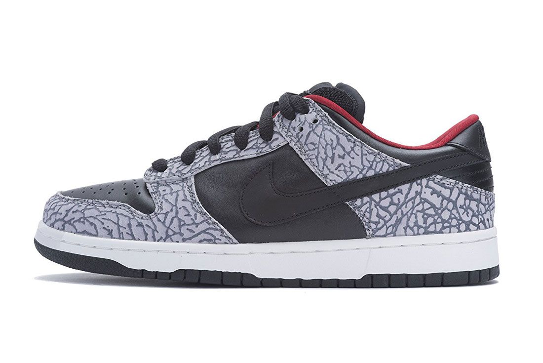 Nike Sb Dunk Low Supreme Black Cement Header Lateral Side