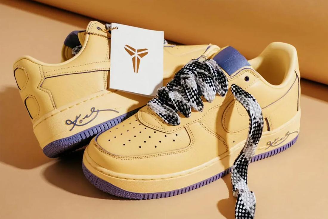 Kobe Nike Air Force 1 yellow sneakers on a yellow surface
