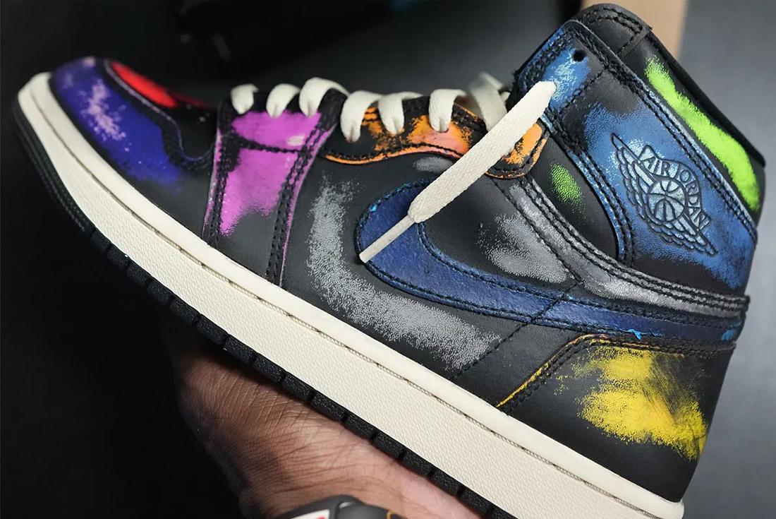 air jordan 1 self expression sneaker held in person's hand