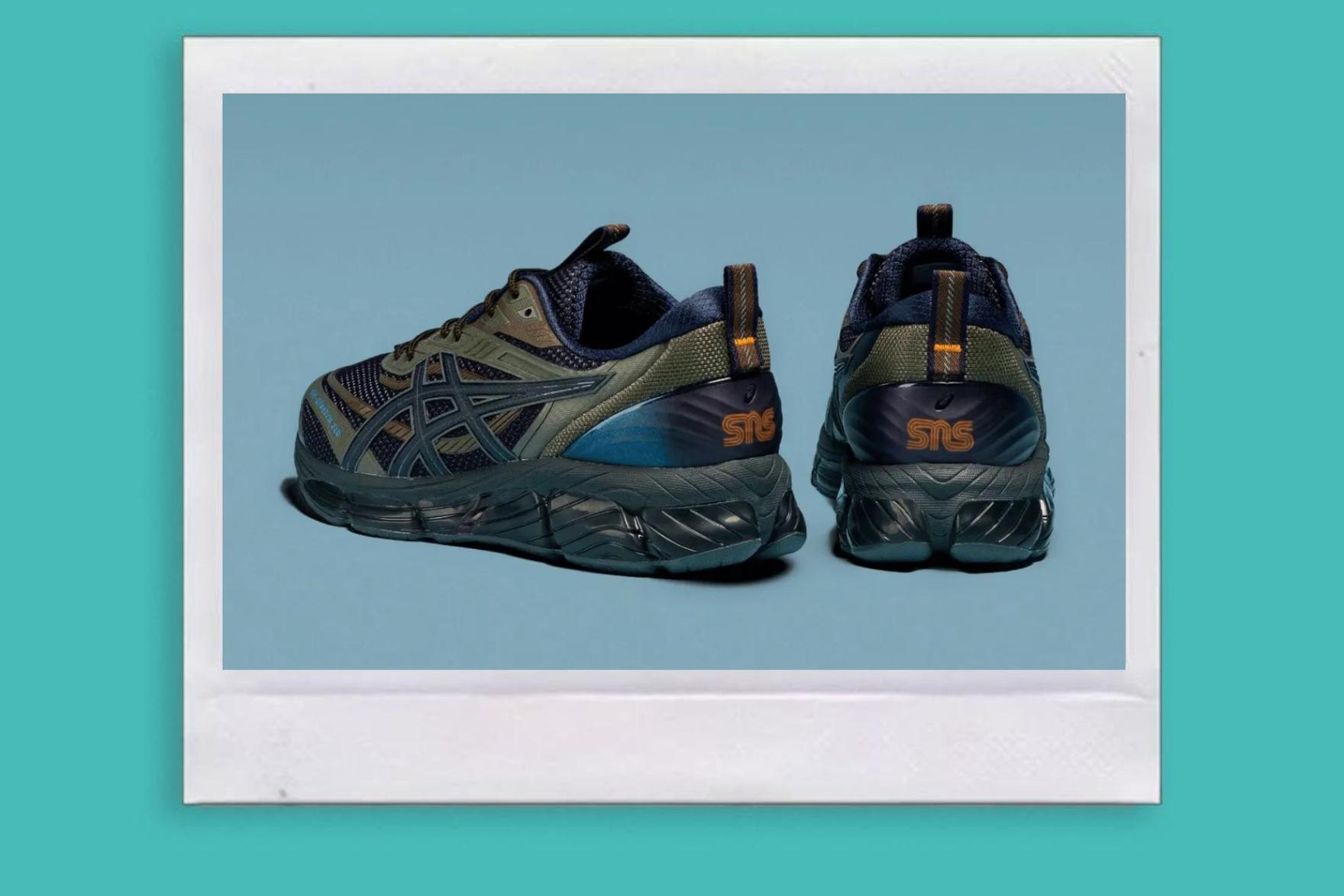 Dark-coloured ASICS sneakers with 'SNS' branding on heel